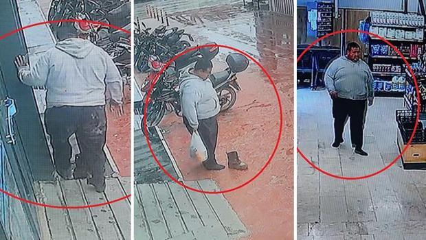 Hatay'da çamurlu ayakkabısını çıkartıp, market alışverişini öyle yaptı
