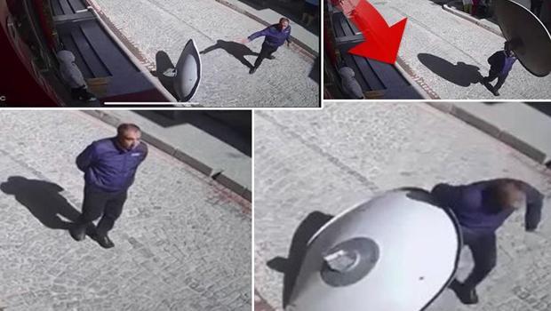 İnanılmaz anlar! Sokakta yürürken üzerine çanak anten düştü